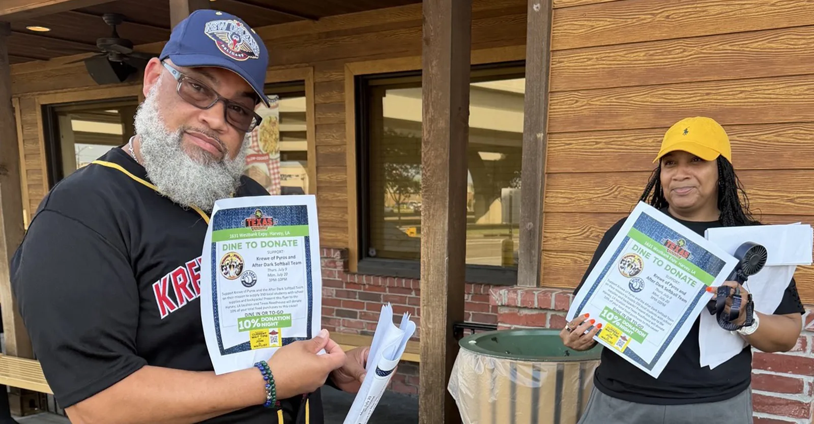 Members handing out Dine to Donate flyers to support school supplies for local students