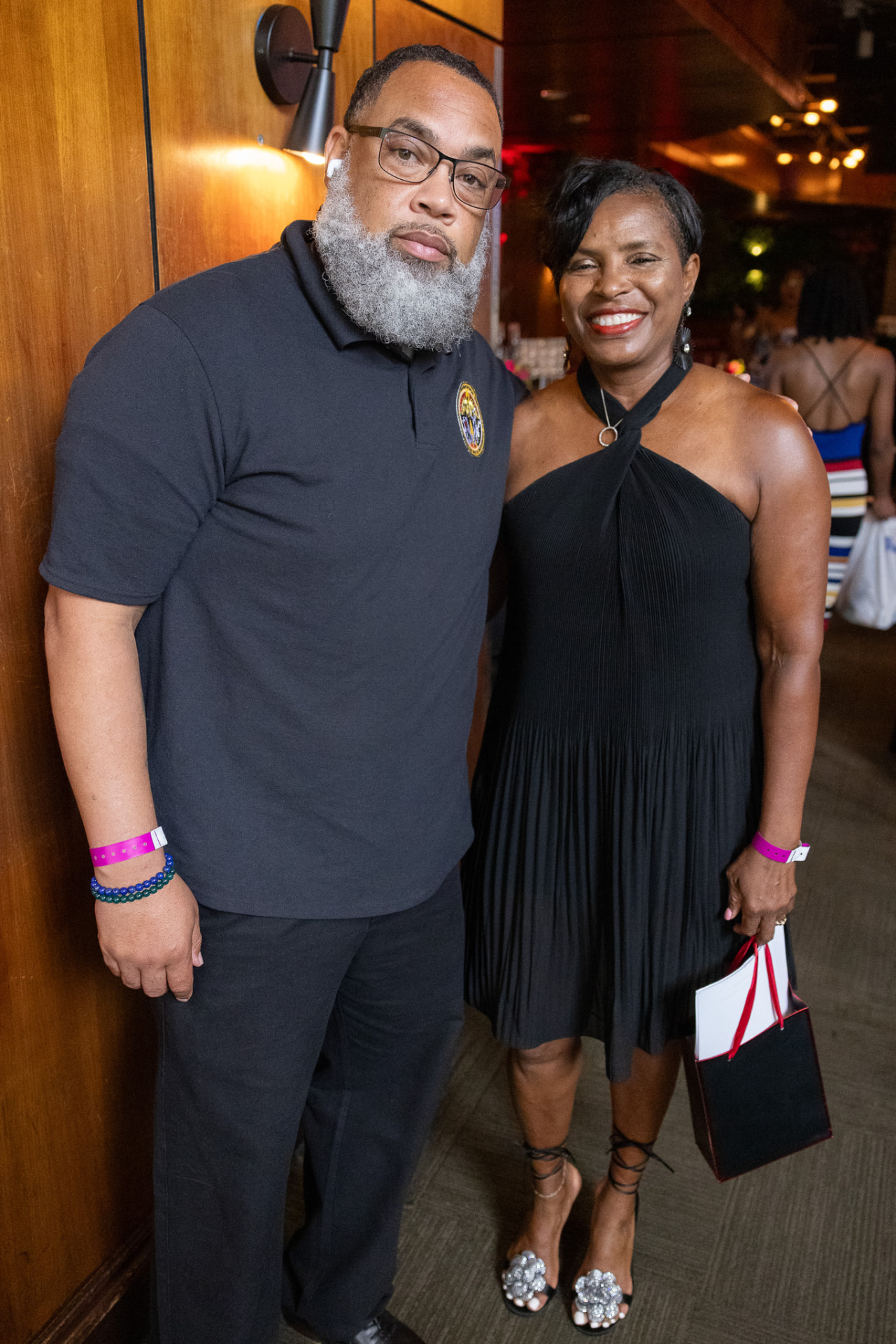 Two guests posing together at the Krewe of Pyros Fundraising Brunch